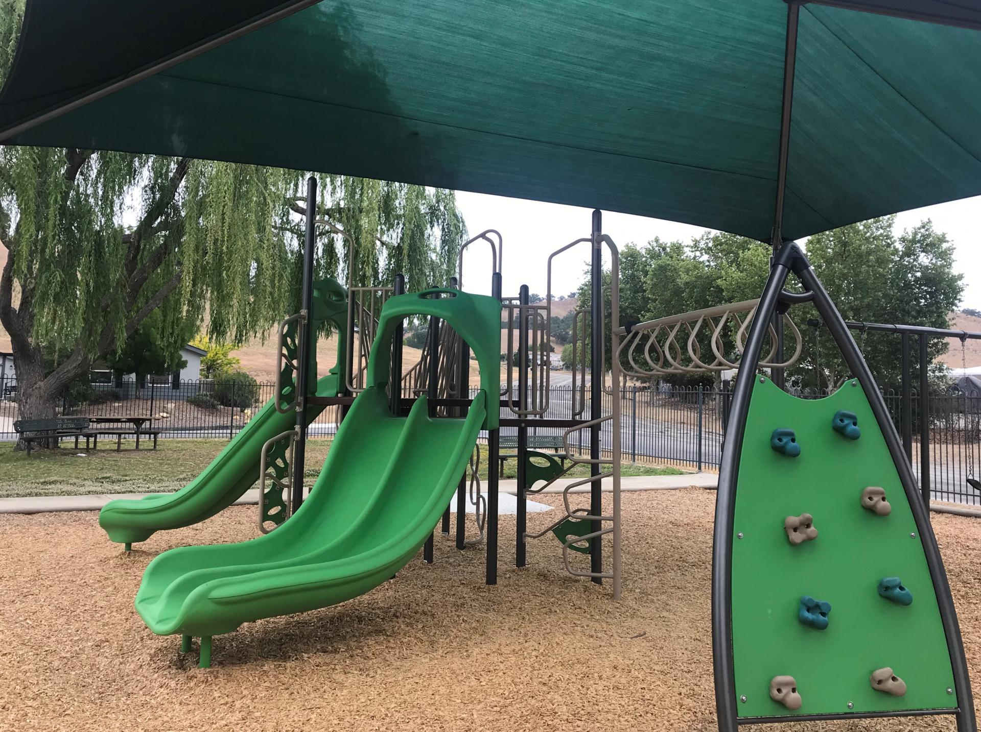 Equestrian Park Playground Rock Wall and Slides